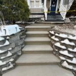 Step-by-step masonry work in progress in Newton, NJ. Foundation set, bricks laid, and mortar applied by Deluxe Construction for a long-lasting finish